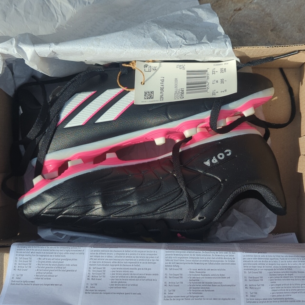 Brand new size 2 adidas cleats.